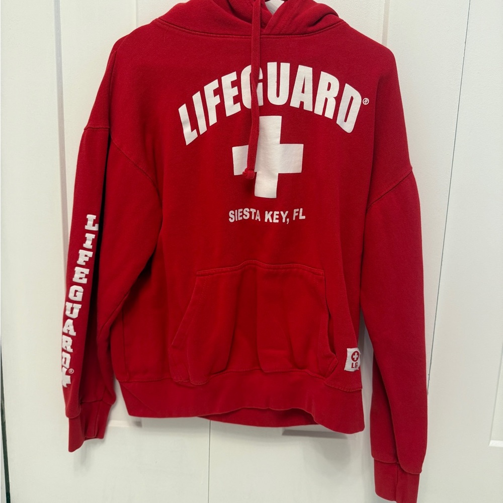 Vibrant Red Lifeguard Sweater with White Cross